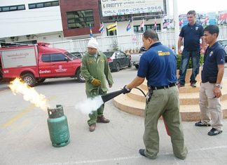 Immigration officials are given realistic hands on training in basic fire-fighting techniques using extinguishers.